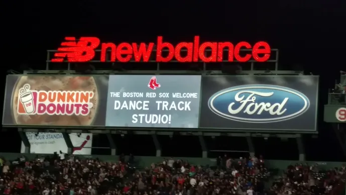 A large sign that says " dance track studio ".